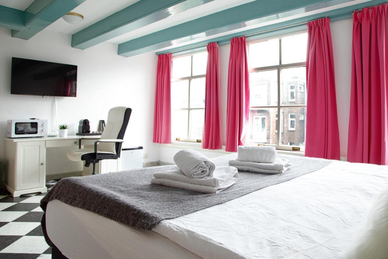 Modern Canal House Loft - City Center Amsterdam Bagian luar foto